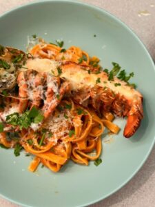 Lobster pasta prepared by a private chef