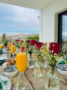Mimosas and brunch set-up on a villa terrace
