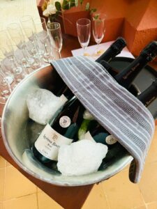 Champagne chilling in an ice bucket at an event