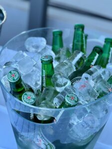 Bottled water chilling in an ice bucket for event drinks service