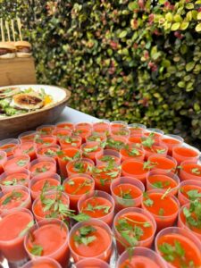 Gazpacho shots served as canapés at a catered event