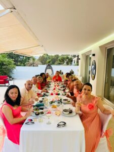 Guests at a long dinner table during a private party on the Costa del Sol